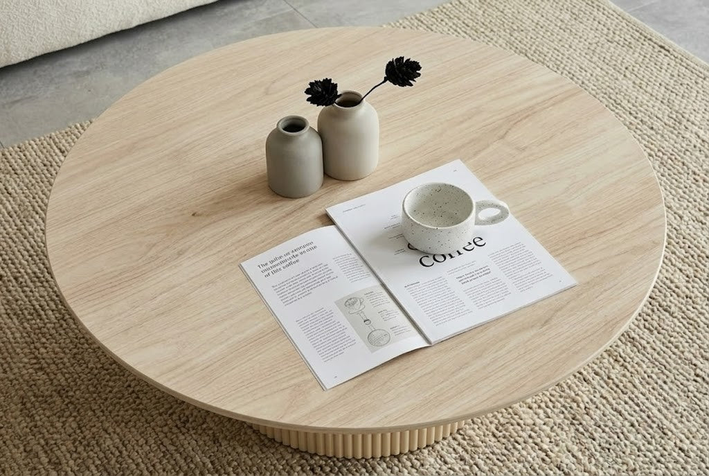 TABLE BASSE RONDE CALYPSO EFFET TRAVERTIN / PIED BEIGE